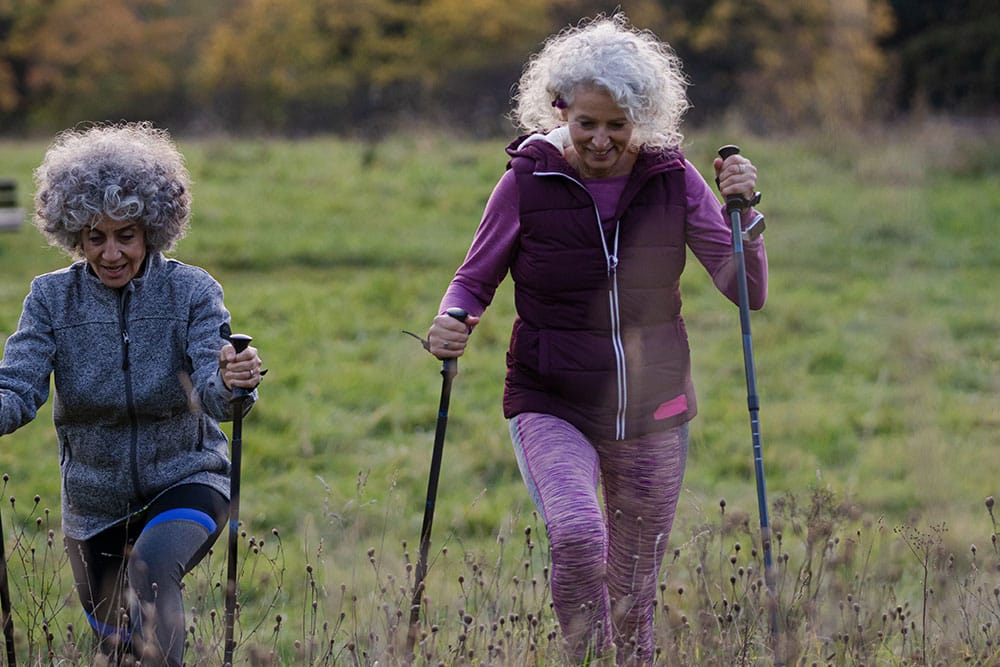 Two women having a catch-up in nature for Time to Talk Day